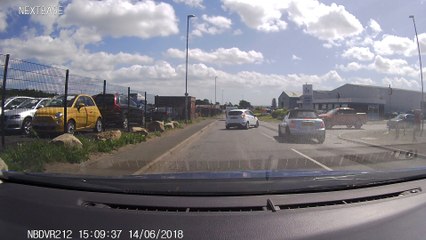 Mini Rolls After Colliding with Turning Car