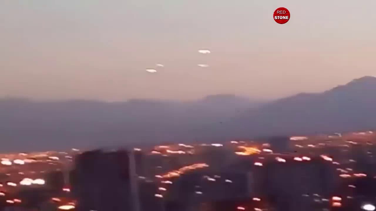 UFO NEWS . 5 UFOs appear over Santiago Mountains Chile