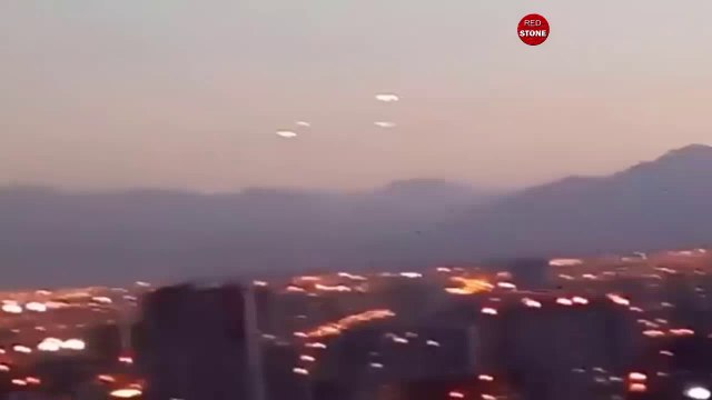 UFO NEWS . 5 UFOs appear over Santiago Mountains Chile