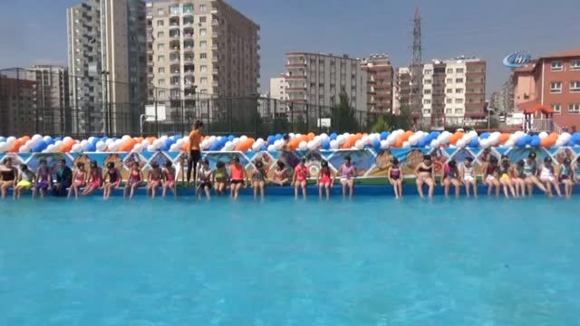 Mahalleye Kurulan Havuzla Lisanslı Sporcu Oldular