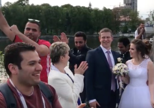 Egyptian World Cup Fans Dance and Sing Around Russian Newlyweds