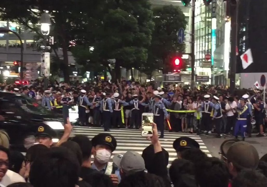 Jubilant Soccer Fans Celebrate Japan's World Cup Opening Win in Tokyo