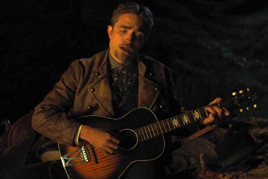Damsel Clip - Just a Sweet Little Ballad - Robert Pattinson sings