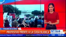 Cerca de 150 personas protestan frente a la Casa Blanca contra las políticas migratorias de Trump