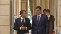 Macron y Sánchez  defienden centros de desembarco de inmigrantes en la UE