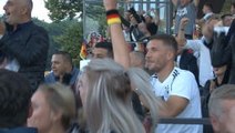 Podolski celebrates Germany late winner
