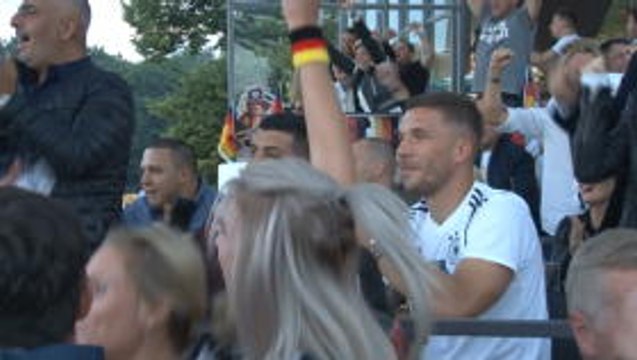 Podolski celebrates Germany late winner