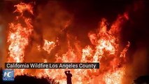 A raging wildfire on Sunday threatened to cut off access to a rural community in northern California.