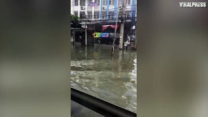 Bus Driving Through Flooded Road