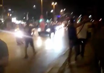 People in Istanbul Honk, Wave Flags to Celebrate Election Results