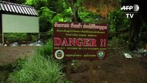 Rescuers look for children trapped in Thailand cave