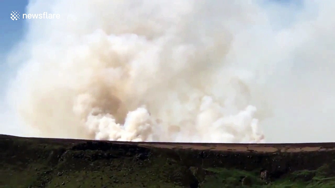 Large moor fire sends plume of smoke into skies over Saddleworth