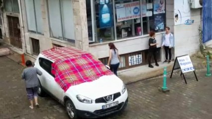 Doluya karşı battaniye ve kartonlu önlem