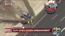 SUV goes down embankment along I-17