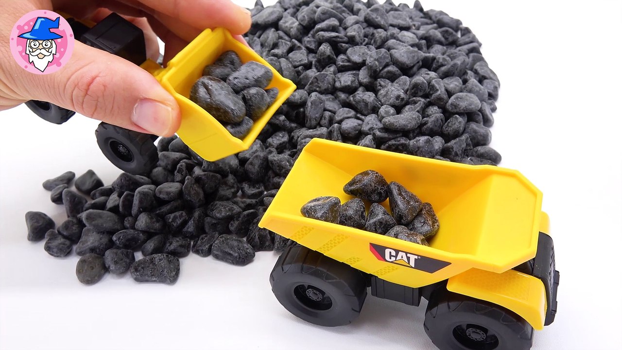 Construction Toys play. gravel construction site.