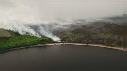 Download Video: Firefighters battle moorland blaze in Greater Manchester