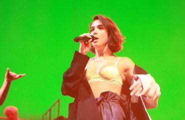 Dua Lipa bursts into tears after cutting show short due to ear infection