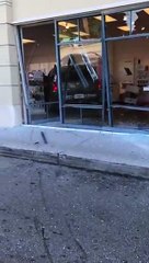 ANGRY LADY DRIVES SUV INTO T MOBILE STORE PALM SPRINGS FL