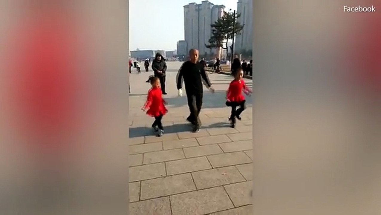 عجوز يؤدي رقصة مذهلة مع طفلتين.. فيديو يحقق 4 م...