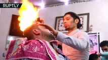 حلاق فلسطيني يشعل النار في شعر زبائنه.. والسبب لا يصدق
