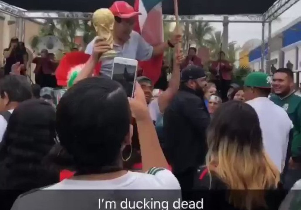 Korean Man Carried Aloft by Mexico Soccer Fans in LA After World Cup Win