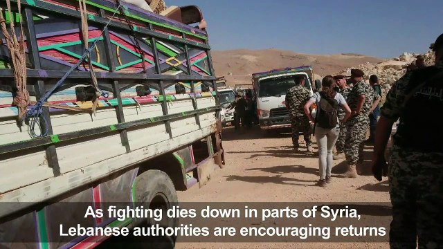 Hundreds of Syria refugees return home from Lebanon border town