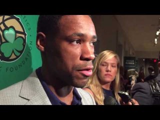 Celtics rookie Demetrius Jackson shows off his puppy lined suit