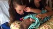 Big sisters meet their baby brother for the very first time and their reactions are precious.