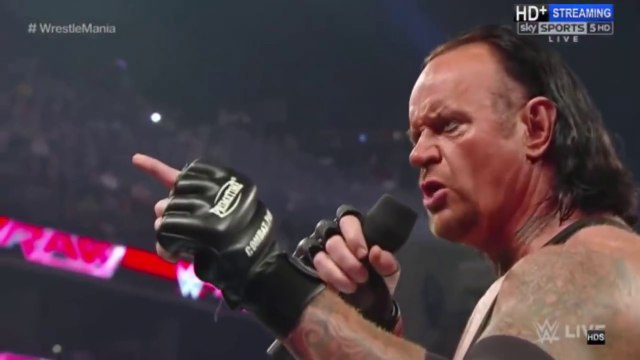 شين مكمان يدمر الاندرتيكر عرض الرو قبل الراسلمينيا /Shane McMan destroys the Undertaker 's premiere before Rasmaliania (3/29) 3/29