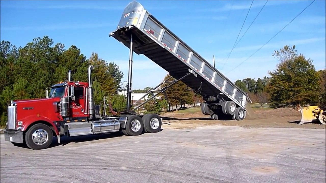Kenworth W900L Dumping Frameless Dump Trailer