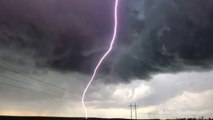 AccuWeather storm chaser, Reed Timmer, screams and runs for cover after close call with lightning