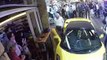 Moment Lamborghini rolls down busy street and smashes into bar