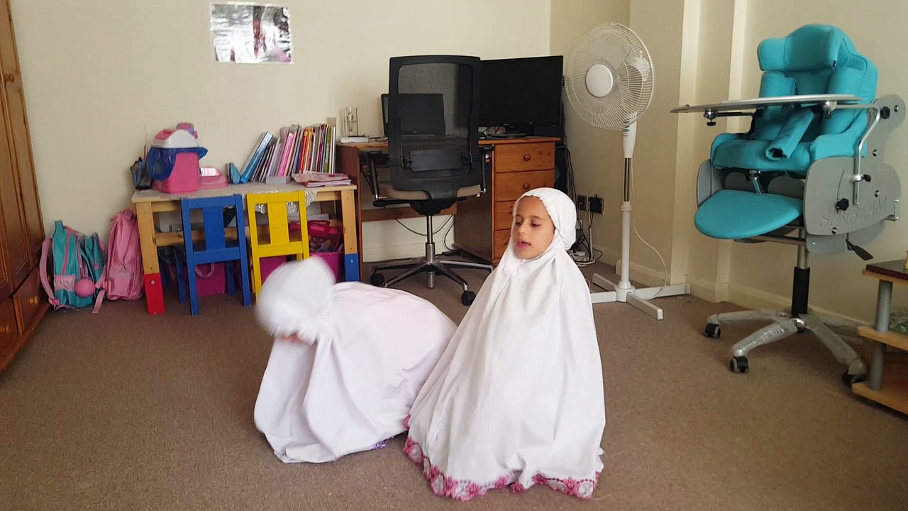 Asmaa & Alaa Praying