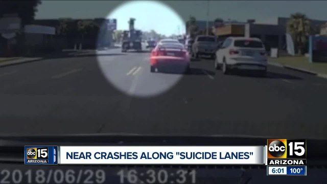 Dash camera captures near crash in 'suicide lane' in Phoenix