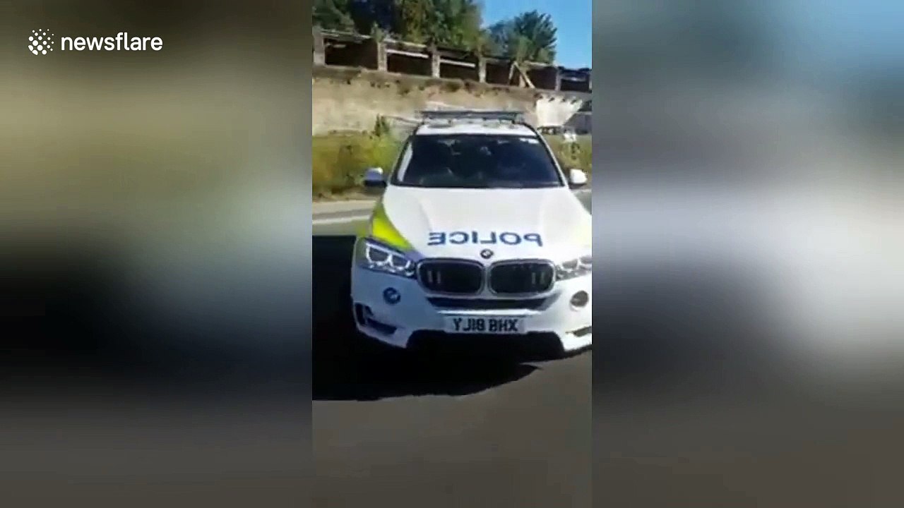 Bus tears off roof under bridge in Bradford, UK