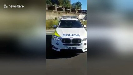 Bus tears off roof under bridge in Bradford, UK