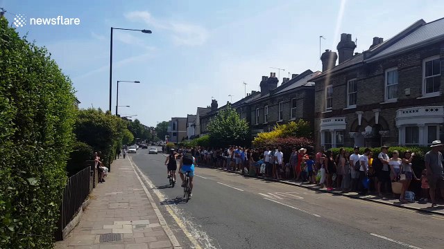 Scores of Londoners queue for outdoor swimming pool during heatwave