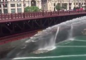 Chicago Firefighters Hose Down Steel Bridge During Heat Wave