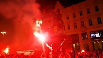 Croatians celebrating their team victory against Denmark last night at capital Zagreb