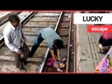 Baby has miraculous escape after slipping under moving train | SWNS TV