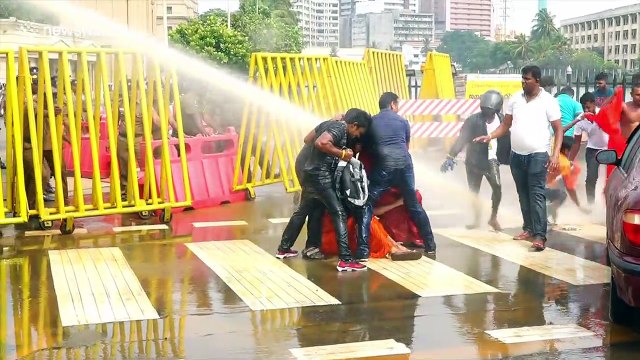 Police deploy tear gas, water cannon against hard-line Buddhist monks in Sri Lanka