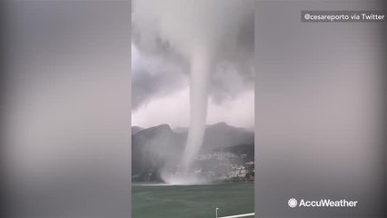 Onlookers watch in awe as massive tornado spins nearby