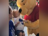 WARM YOUR HEART! Winnie the Pooh shares special moment with disabled child at Walt Disney World - ABC15 Digital