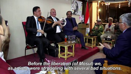 After years of silence, music fills streets of Iraq's Mosul