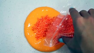 Making Halloween Themed Candy Corn Foam Bead Slime with Balloons!