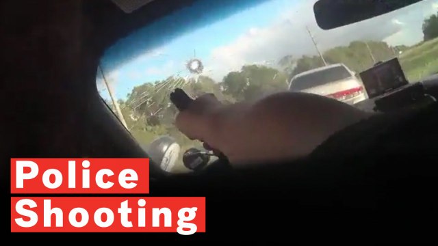 Police Officer Shoots Through Windscreen To Arrest Wanted Suspect