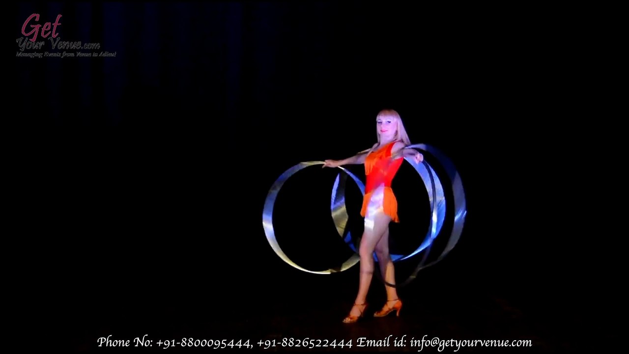 Wedding Entertainment - Hula Hoop Dance by wedding planners in Delhi | GetYourVenue