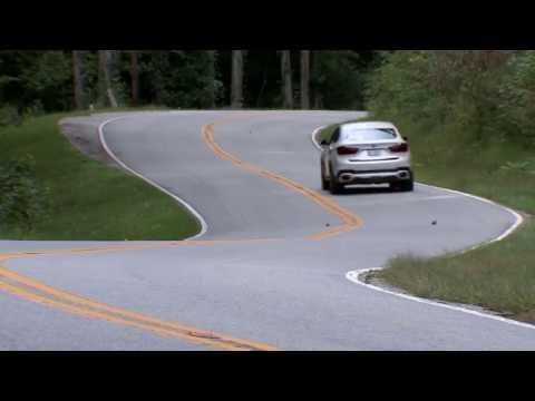 The new BMW X6 xDrive50i. Driving Video country road | AutoMotoTV