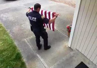Patriotic Washington Police Officer Saves Fallen US Flag on July 4th