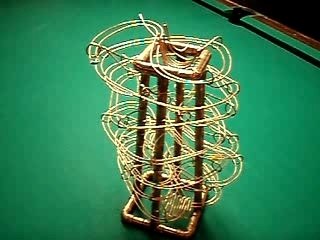 Small copper rolling ball sculpture. Desktop